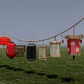 Colorful Traditional Lanterns Hanging On Rope Over Green Grass Field