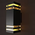 Modern Black Wall Lamp With Yellow Illuminated Layers And Sleek Design