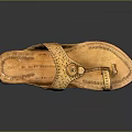 Brown Leather Thong Sandals With Handcrafted Perforated Details And Comfortable Sole