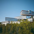 Modern Hillside Architectural Design Featuring White Horizontal Structures Large Windows And Green Trees
