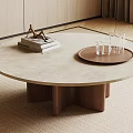 Round Marble Top Coffee Table With Wooden Geometric Legs And Books Sculpture Tray