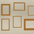 Golden Picture Frames With Various Styles Hanging On Beige Wall