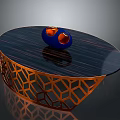 Modern Round Coffee Table With Dark Wooden Top Orange Geometric Base And Blue Decorative Bowl