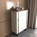 Modern Chest of Drawers with Upholstered Front Gold Accents Wooden Tray Teapot Plant on Top