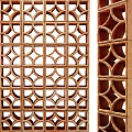 Wooden Room Divider With Geometric Pattern And Arched Panel Design