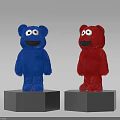 Blue and Red Bear Shaped Plush Toys Standing on Gray Hexagonal Pedestals