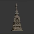 Ancient Carved Stone Tower with Ornate Base Spire and Intricate Traditional Design