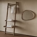 Bathroom Accessories With Wooden Towel Ladder Folded White Towels And Oval Wooden Mirror On Wall