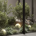 Indoor Landscape Design With Glass Walls Various Green Plants Round Lights Stones And Ground Cover