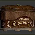 Brown Decorative Storage Box With Intricate Gold Patterns And Green Leaf Decoration On Top