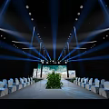 Stage With Blue Lighting Large Screen Seascape View Neatly Arranged White Chairs And Green Plants