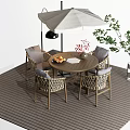 Outdoor Table and Chair Set with Umbrella on Wooden Deck Fruit Plate and Flower Vase