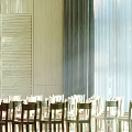 School Classroom Interior With Rows of Wooden Chairs Green Blackboard and Wooden Decorated Walls