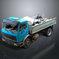 Blue Dump Truck Loaded With Tires And Other Items On Gray Background