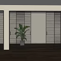 Modern Black Slatted Sliding Doors In Interior Space With Wooden Floor And Green Plant
