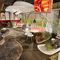 Modern Restaurant Interior With Transparent Spherical Dining Pod Red Sofa Bamboo Screens And Lantern Decorations