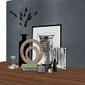 Decorative Ornament Set with Spiral Decor Hourglass Butterfly Wall Art and Book on Wooden Table