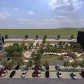 Lush Urban Park Landscape With Green Lawn Trees Parking Area And Surrounding Modern Buildings