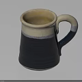 Black and Cream Ceramic Mug With Textured Surface And Curved Handle On White Background