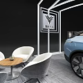 Modern Car Showroom Display Area With Silver Vehicle Large Screen And Green Plants