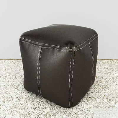 Black Leather Cube Shaped Ottoman With White Stitching On Patterned Rug 3d model