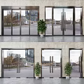 Glass Double Doors In Modern Building With City View And Indoor Plants