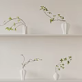 Minimalist White Vases With Green Leaf Branches On Neutral Wall Shelf