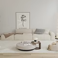 Modern Minimalist Sofa and Coffee Table Set With Beige Throw Pillows Blanket And Wall Art
