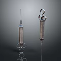 Two Metallic Syringes with Classic Design and Needles as Essential Medical Devices