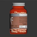 Premium Food Supplement NAC Capsules in Red Bottle with Orange Pills