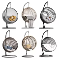 Various Styles of Hanging Chairs with Decorative Cushions and Rattan Designs