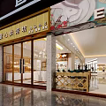 Modern Bright Dessert Shop Interior With Marble Display Counter And Glass Cases