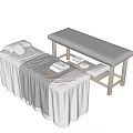 Cozy Massage Bed With Soft Linen Sheets Pillows And Folded Towels