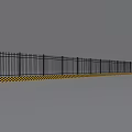 Outdoor Black Spiked Metal Fence With Yellow And Black Warning Stripes