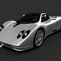 Silver Supercar With Sleek Aerodynamic Body Black Roof And Large Alloy Wheels