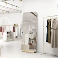 Stylish Floor Mirror in Fashion Boutique with Hanging Dresses and Display Racks