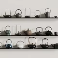 Assorted Tea Set with Teapots and Teacups Arranged on Three Black Shelves 3d model