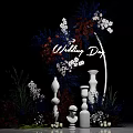 Wedding Day Decor Setup With Floral Arrangement White Pillars And Candles