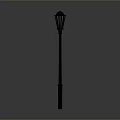 Classic Black Street Lamp With Tall Post Design Standing Against Neutral Gray Background