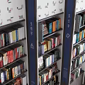 Modern Bookcase Interior With Multiple Shelves And Various Colored Books 3d model