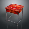 Red Side Table With White Heart Pattern On Top And Metal Legs