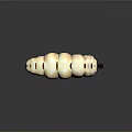 White Larva Like Game Movie Character With Red Spots Curved Body And Small Head