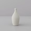 White Ceramic Decorative Ornament Set With Minimalist Design On Gray Tabletop