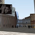 Modern Commercial Street With Contemporary Architecture Large Billboard Pedestrians And Open Public Space