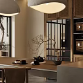 Modern Open Dining Living Room Interior With Wooden Beams Pendant Lights And Island Counter