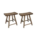 Two Rustic Wooden Stools With Simple Design And Natural Wood Grain