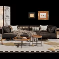 Stylish Black Leather Sofa With Brown Coffee Table Decorative Pillows Table Lamp And Area Rug