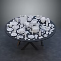 White Tableware Set Displayed On Round Table With Plates Cups Bowls And Utensils
