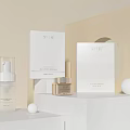 Premium Perfume And Skincare Products With Glass Bottles White Boxes On Minimalist Light Background