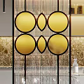 Transparent Glass Partition With Golden Circular Decorations And Geometric Metal Frames